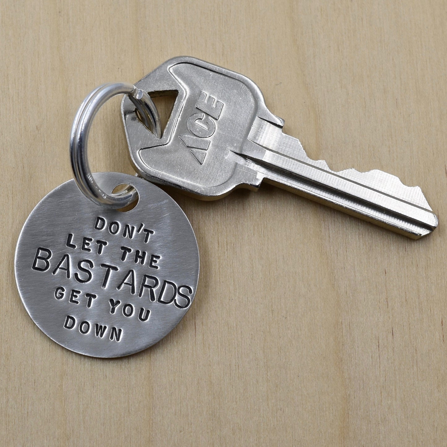 Don't Let The Bastards Get You Down Keychain