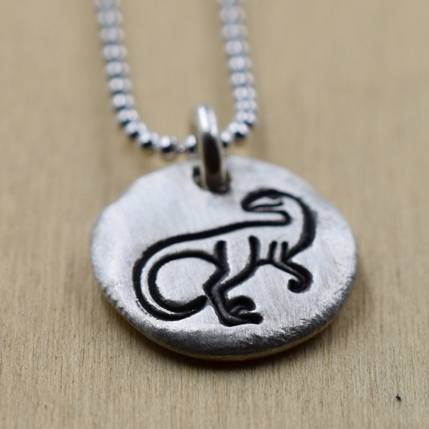 Velociraptor Dinosaur Nugget Necklace