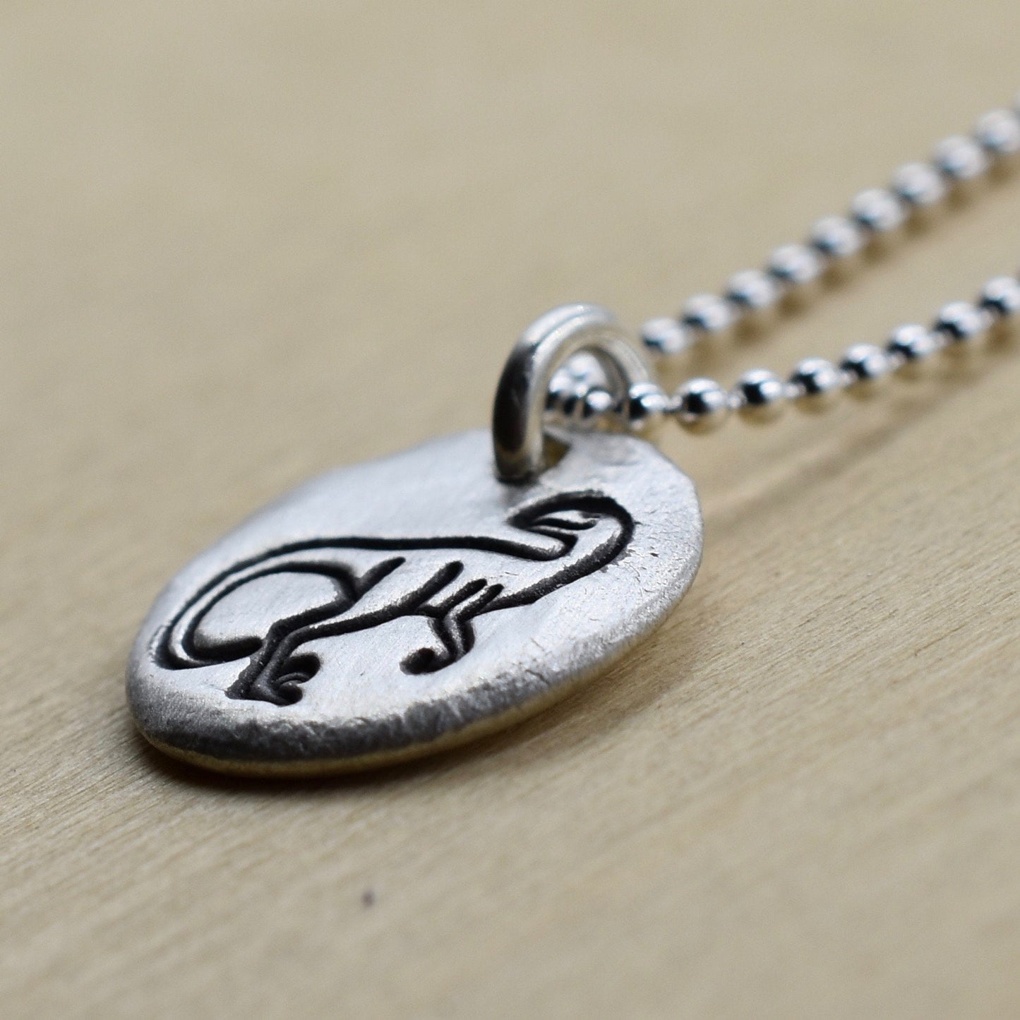 Velociraptor Dinosaur Nugget Necklace