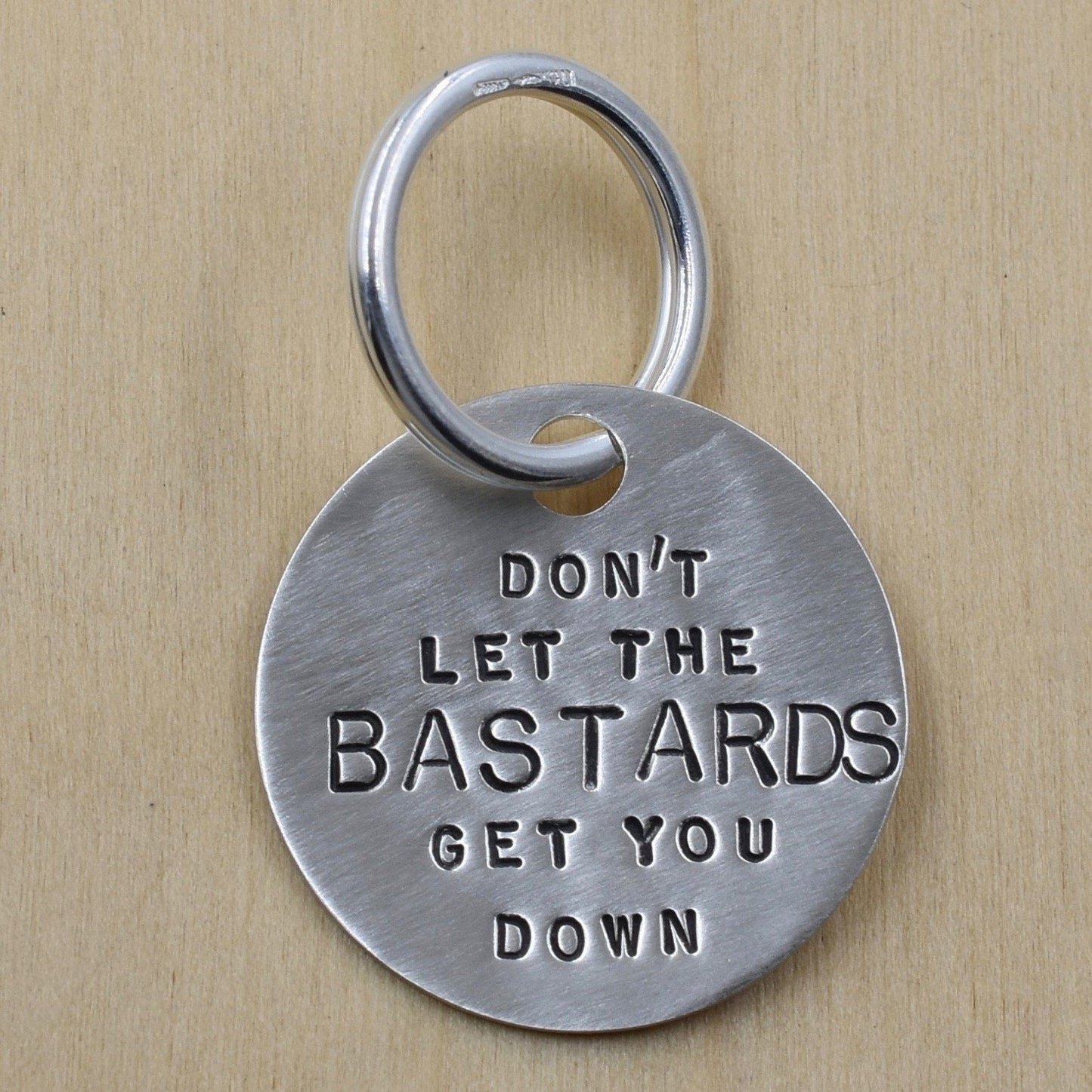 Don't Let The Bastards Get You Down Keychain